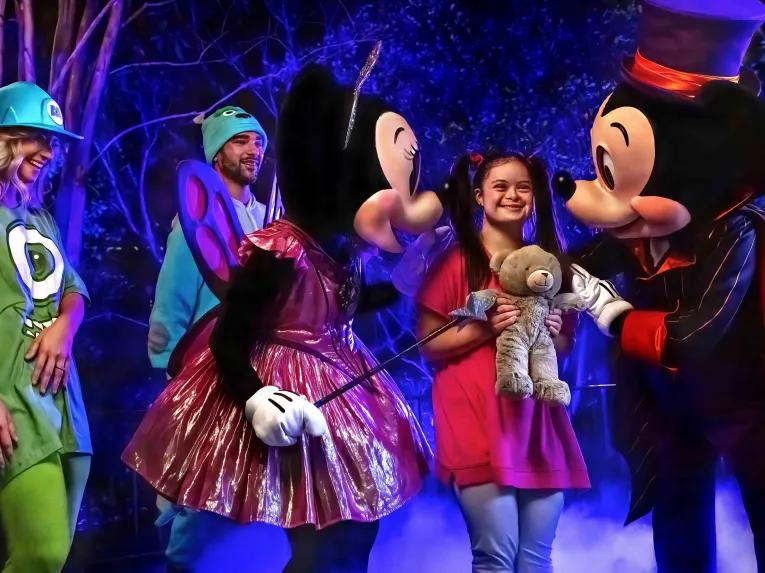 Guests with Mickey and Minnie at Mickey's Not So Scary Halloween Party