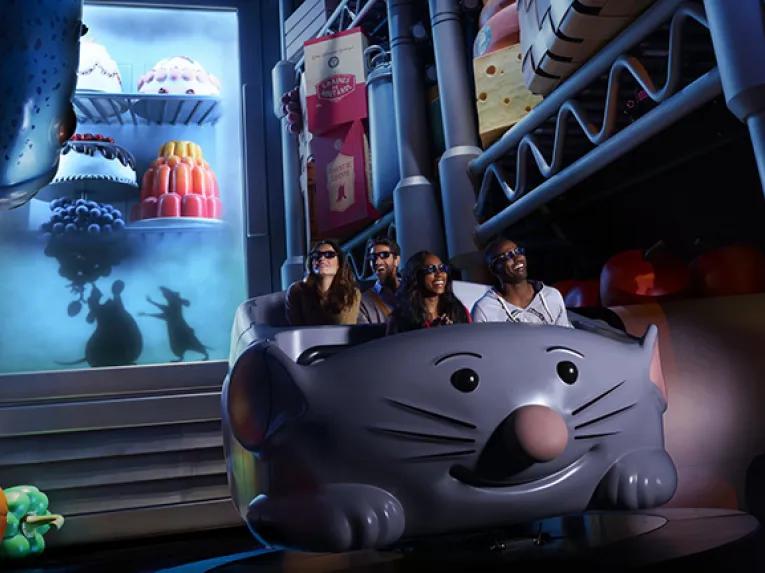 Guests riding Ratatouille: The Adventure