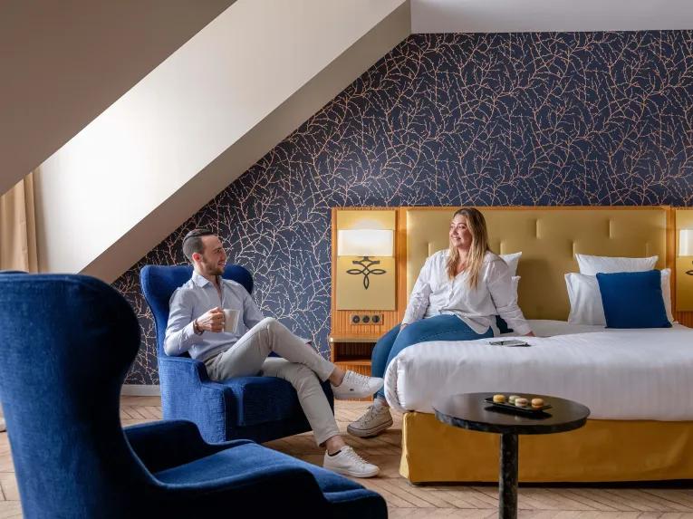 Couple in Junior suite at the Dream Castle Hotel Paris