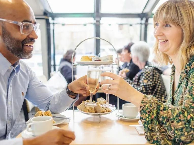 couple-enjoying-afternoon-tea