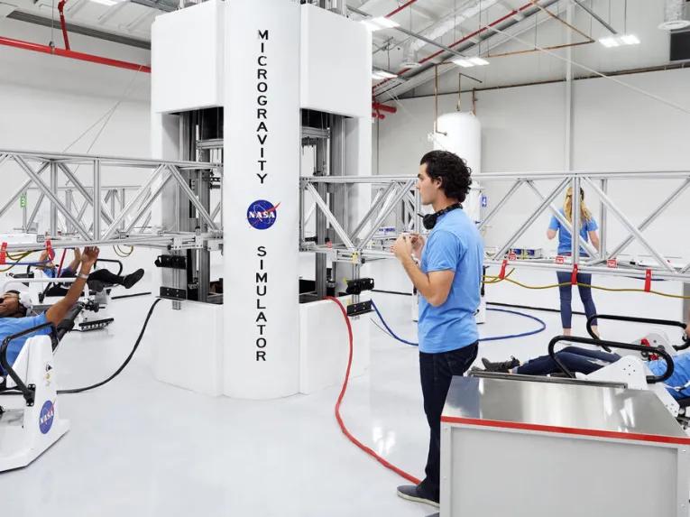 Guests experiencing ATX Microgravity Simulator at Kennedy Space Center Visitor Complex