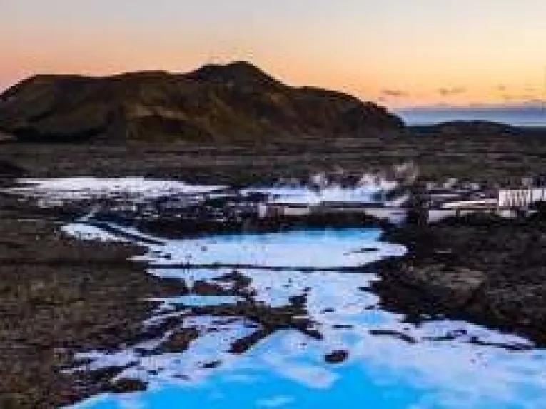 water-by-volcano-sunset