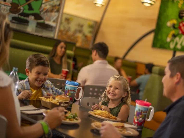 Guests eating at End Zone Food Court, Disney's All-Star Sports Resort