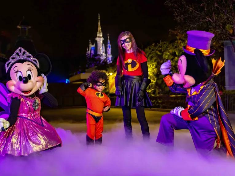 Guests with Mickey and Minnie at Mickey's Not-So-Scary Halloween Party