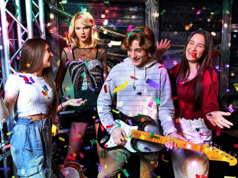 Guests with Taylor Swift at Madame Tussauds Orlando