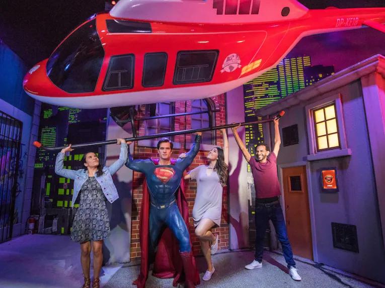 Guests with Superman at Madame Tussauds Orlando