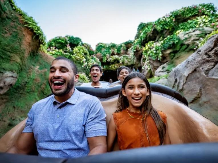 family-enjoying-tianas-ride