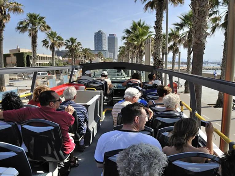 Sightseeing on an open top bus