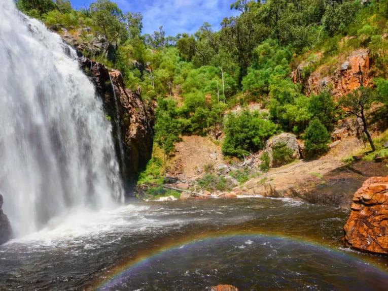 Beautiful Waterfall with a rainbow in the water at MacKenzies Falls