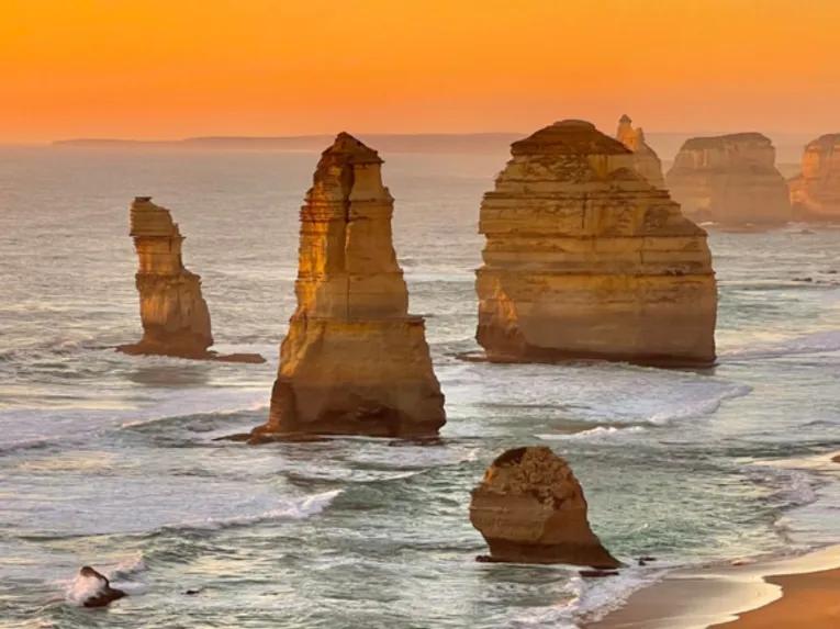 Stunning sunset over the ocean on the Great Ocean Road Sunset Tour
