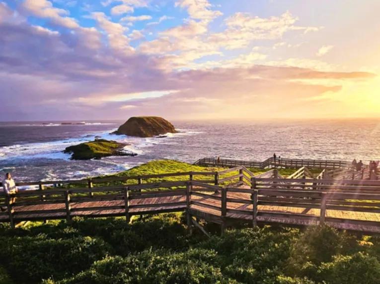 Sunset over the Nobbies on Phillip Island, with dramatic cliffs and ocean views