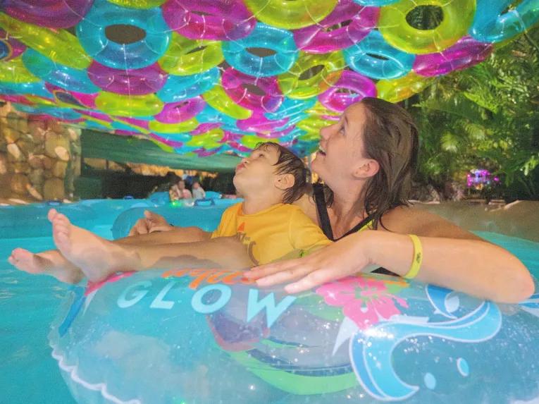 Mother and son at AquaGlow pool party at Aquatica Orlando