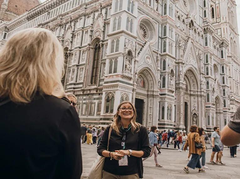 Tour guide outside a Monument