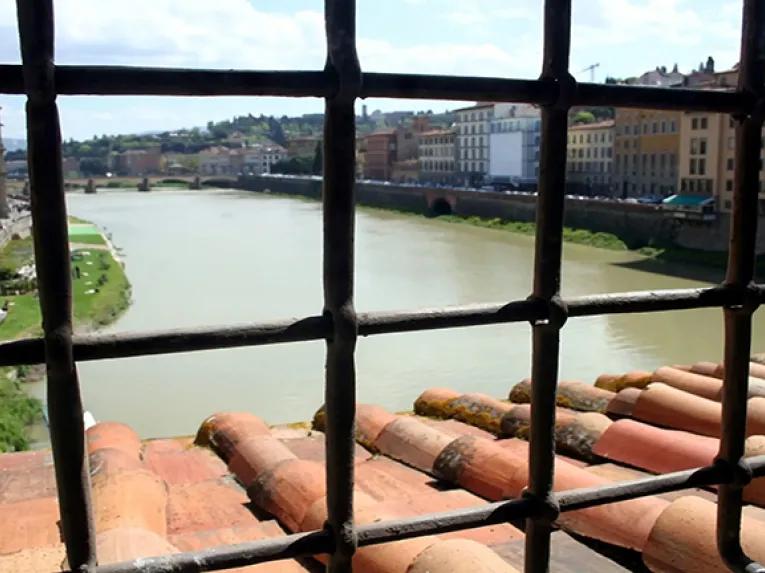 View through Bars at the Arno river