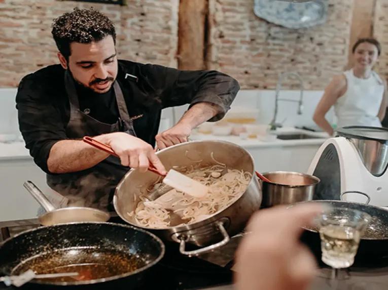 Watching a cooking demonstration