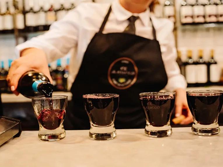 Pouring local drinks