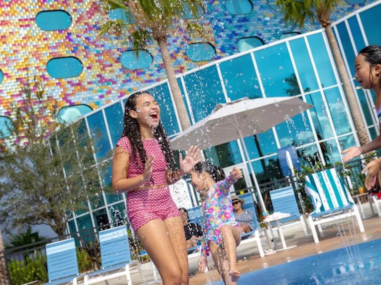 Guests playing in pool area at Universal Stella Nova Resort