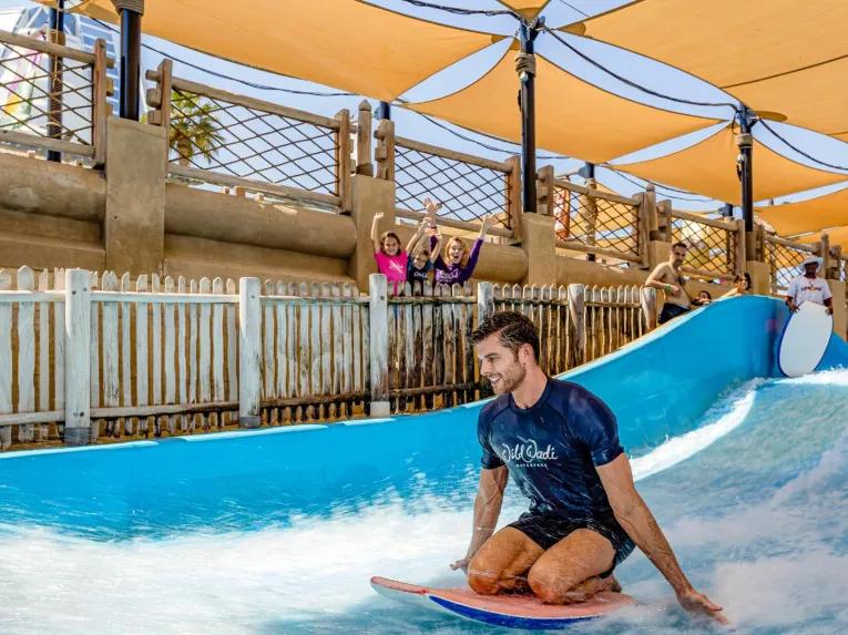 Guest surfing on the FlowRider at Wild Wadi Waterpark in Dubai