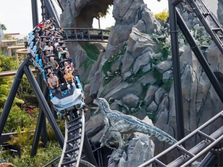 People enjoying a roller coaster