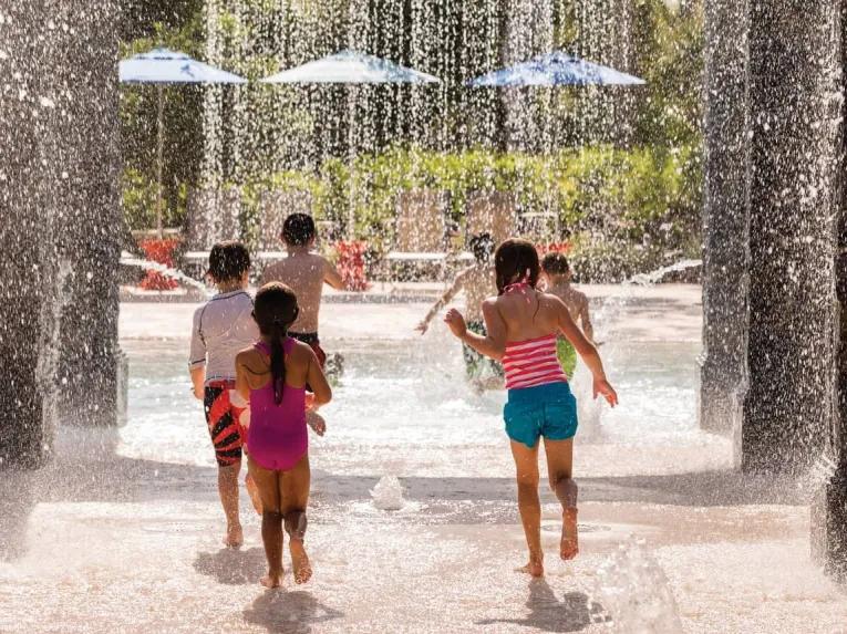 Kids playing in the Explorer Island Water Park Four Seasons Orlando