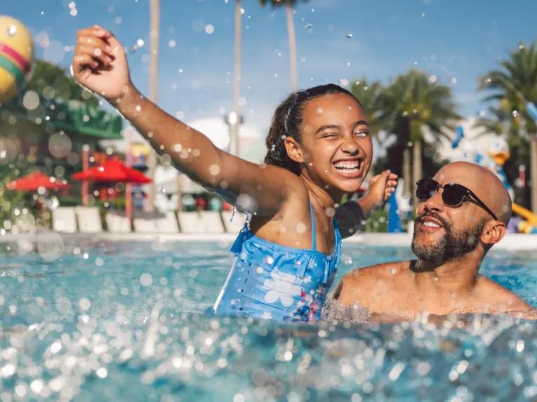 Guests swimming at Disney's All-Star Music Resort