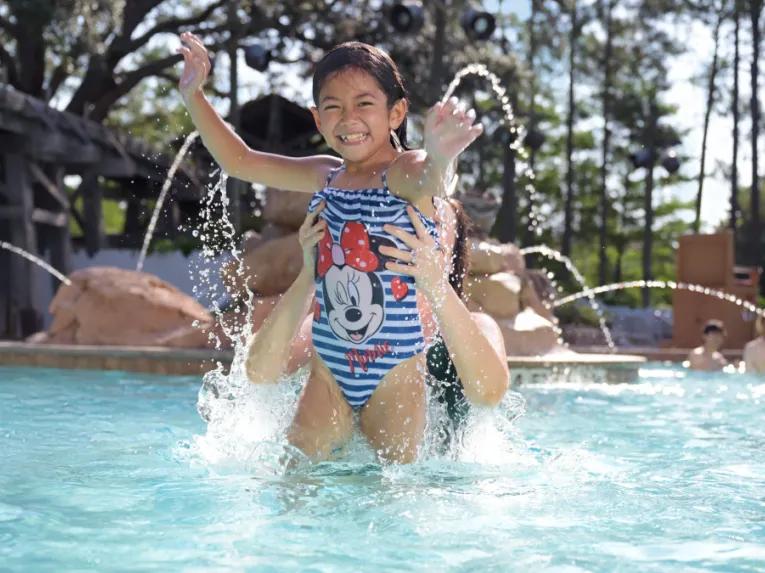 Guests Swimming at Disney's Port Orleans Resort - Riverside