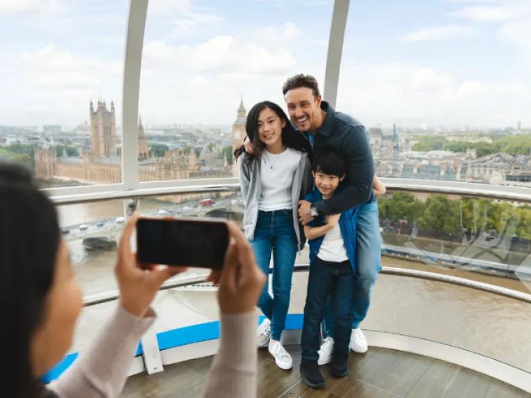 Family taking a photo on the London Eye