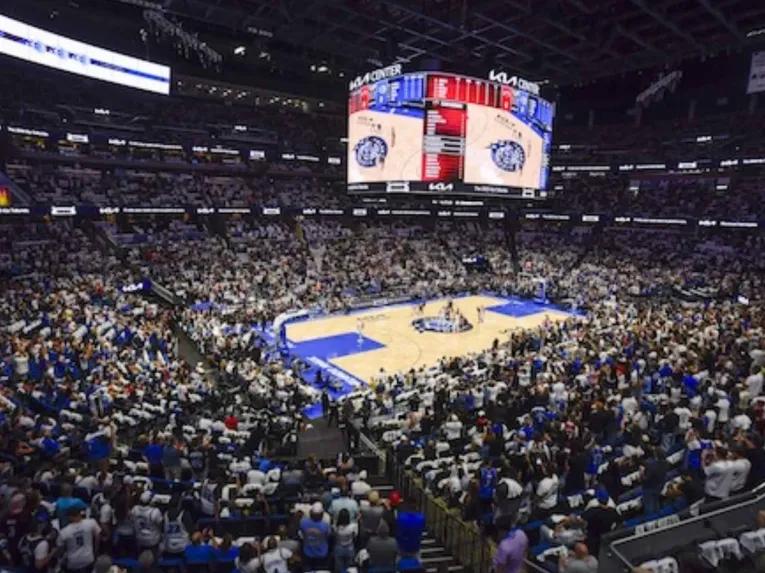 Wide-angle view of a packed Kia Center arena during an Orlando Magic home game
